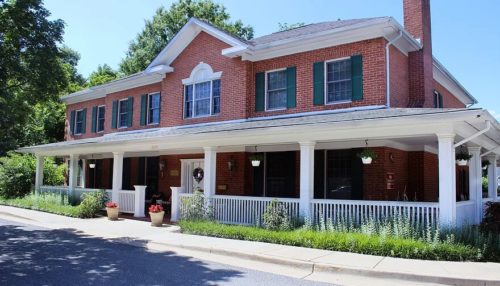 Exterior picture of Auxiliary House, the largest of Cedar Creek's memory care facilities