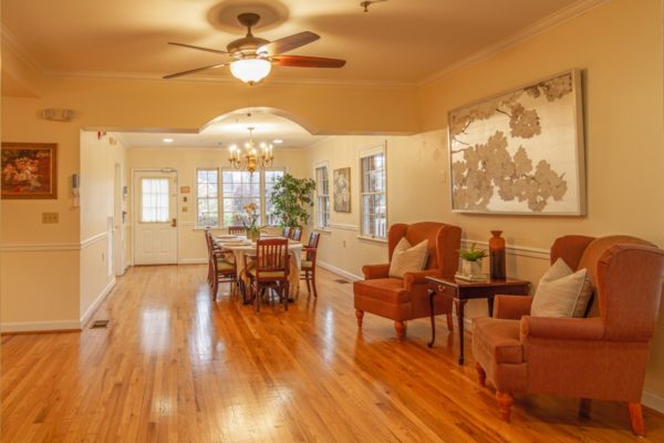living room of auxiliary house memory care home near kensington maryland
