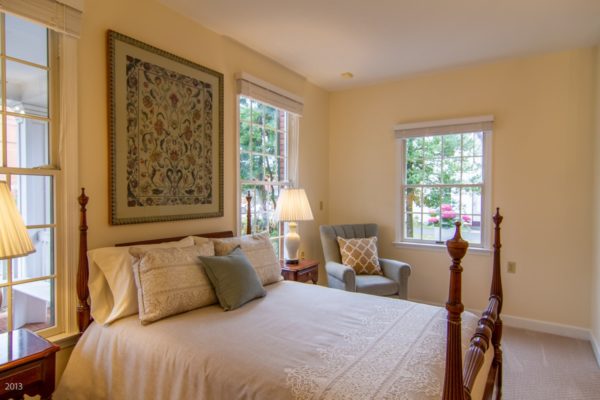 A comfortable bedroom at Cedar Creek Memory Care Homes