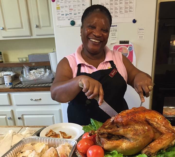 Memory care nurse providing three home cooked meals a day