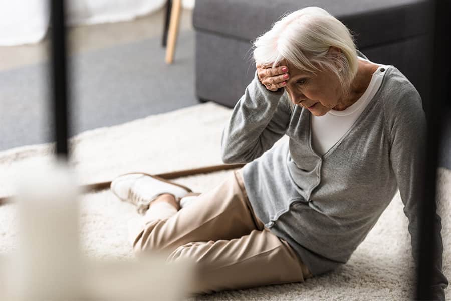 Senior woman fell down is one of the recognizable signs of memory impairment.