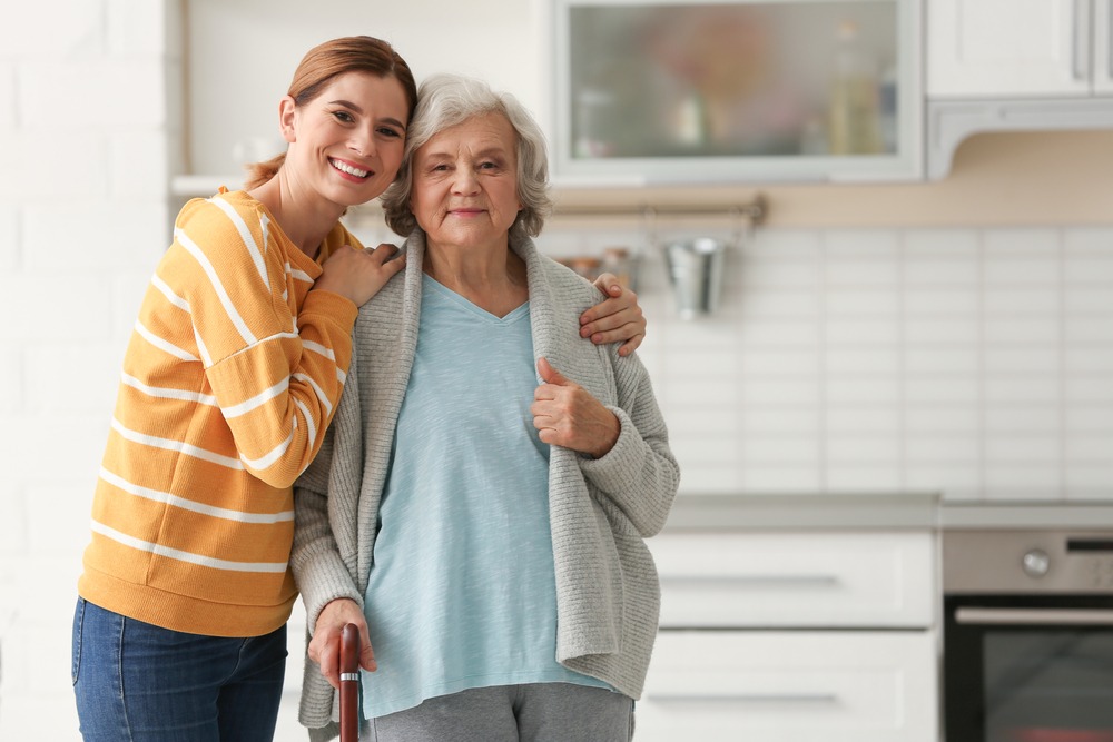 An image representing a daughter and mother at an assisted living facility